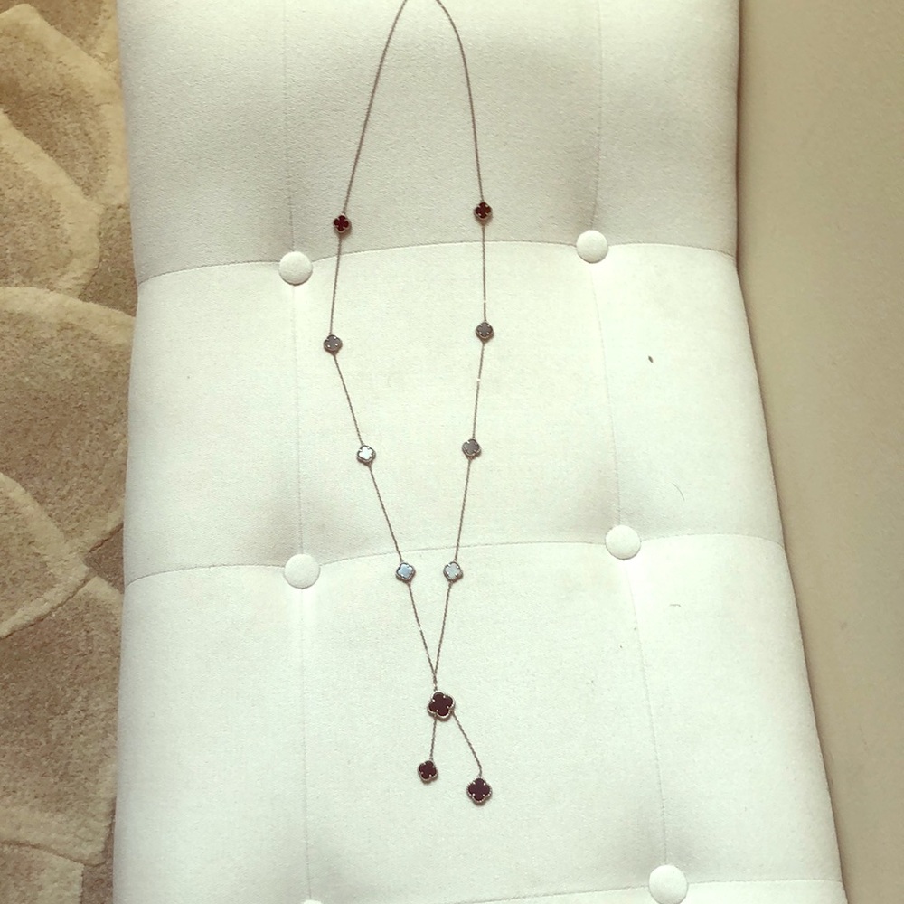 Long silver necklace with the black onyx stone